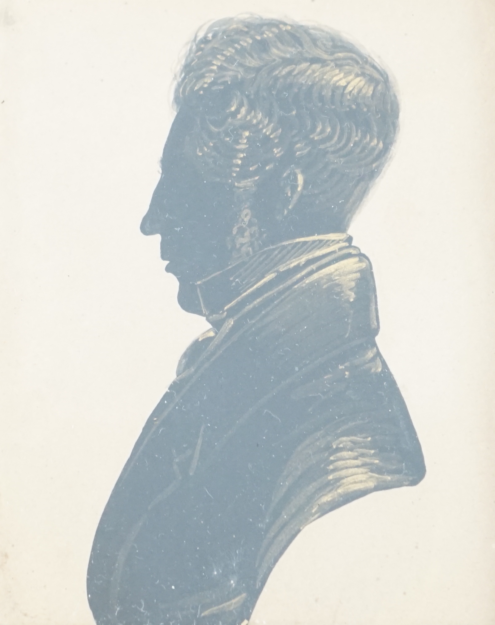 Victorian School, Silhouette of a gentleman, bronzed and cut paper, 7.5 x 6cm.